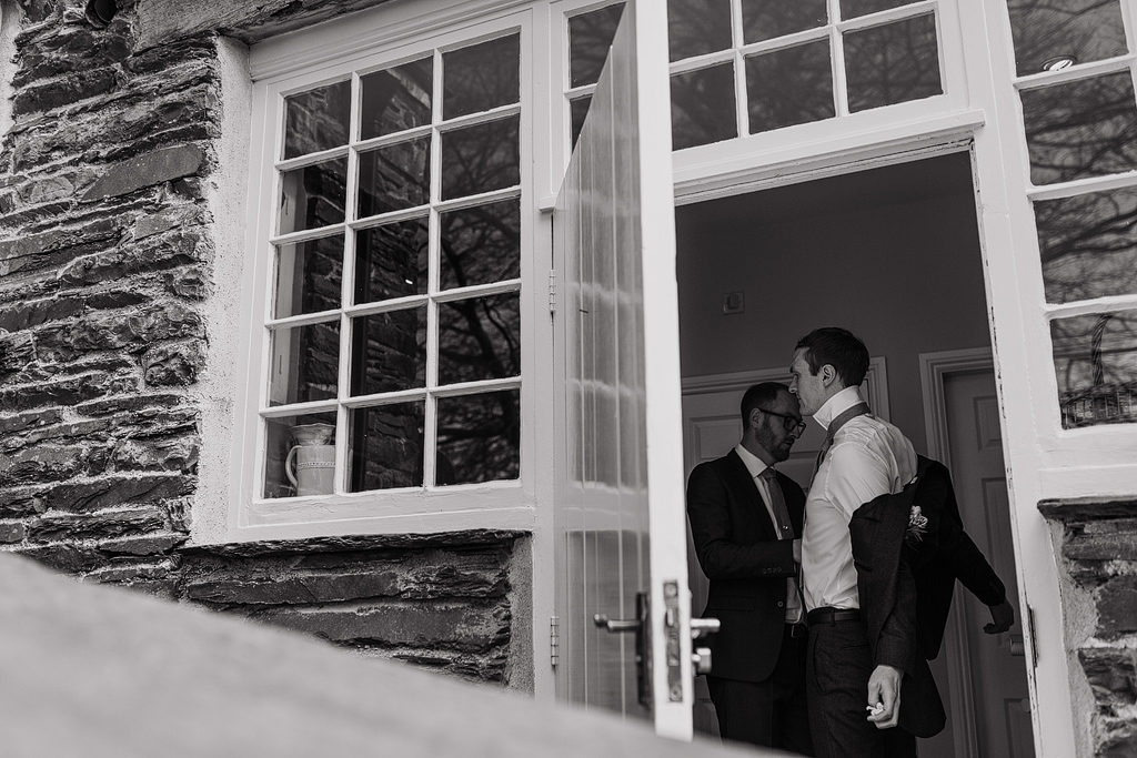 groom getting ready at belmount hall lake district