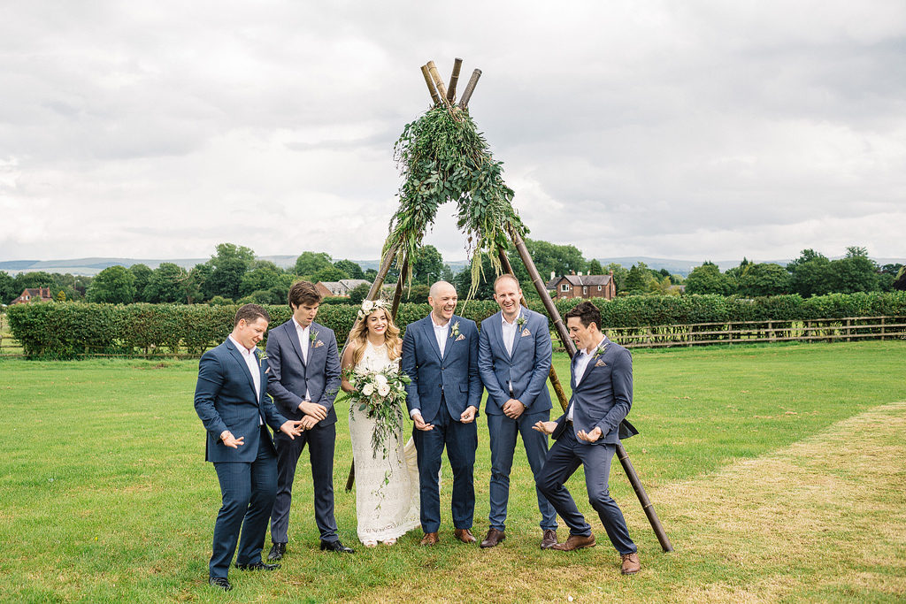out door wedding ceremony with bamboo arbor
