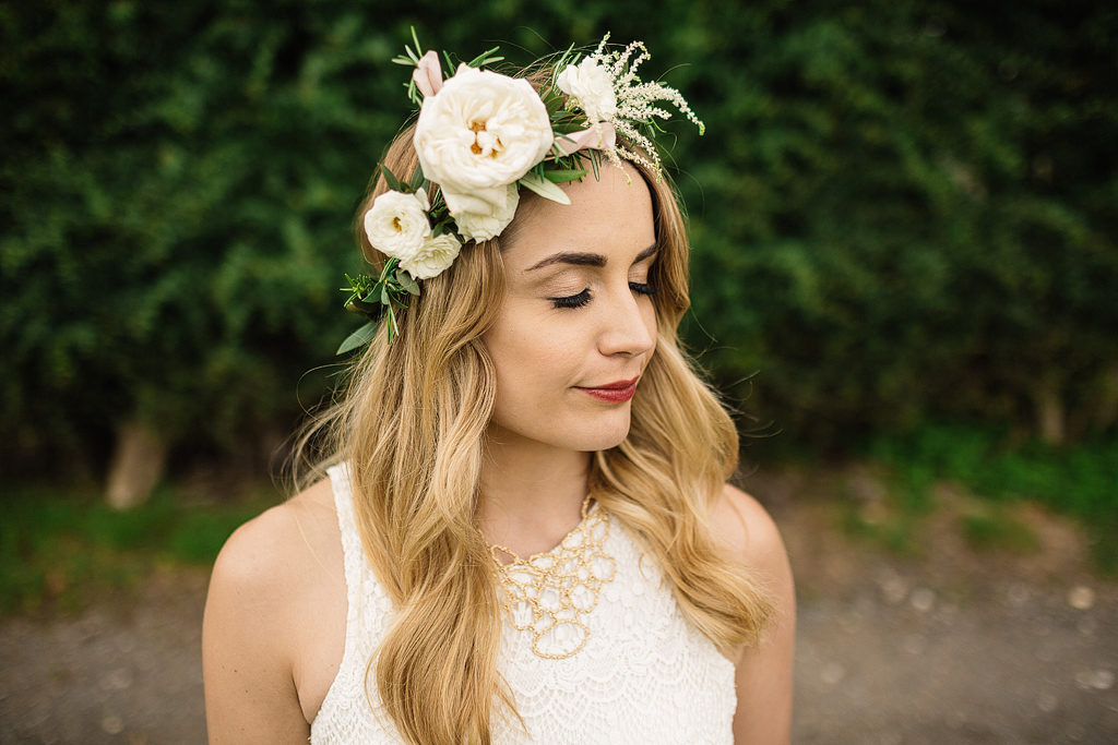 bride wearing a flower crown at tipi wedding in cheshire