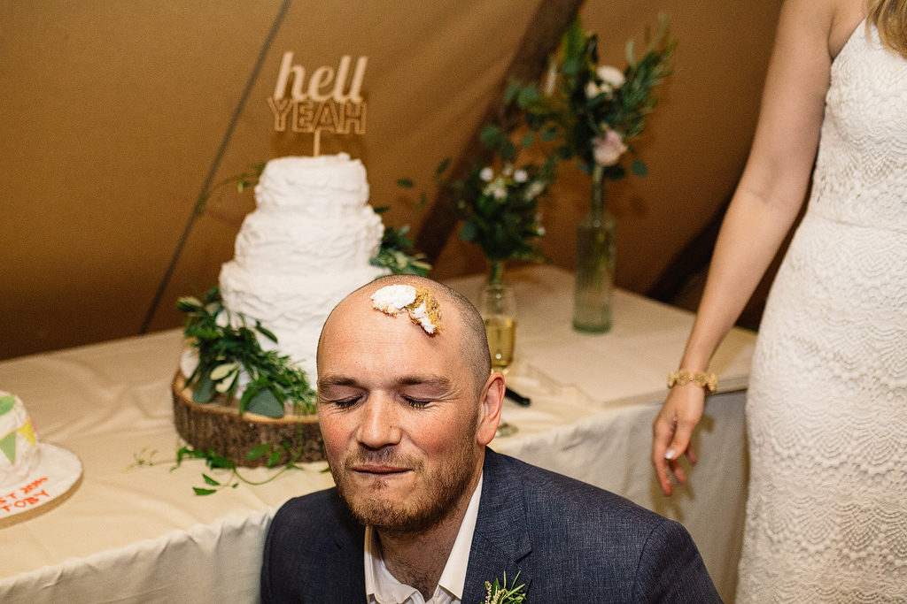 cake on the grooms head