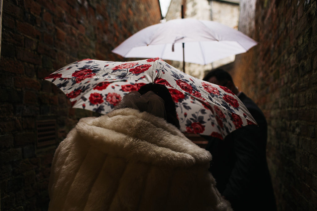 raining on your wedding day with a cath kidson umberella