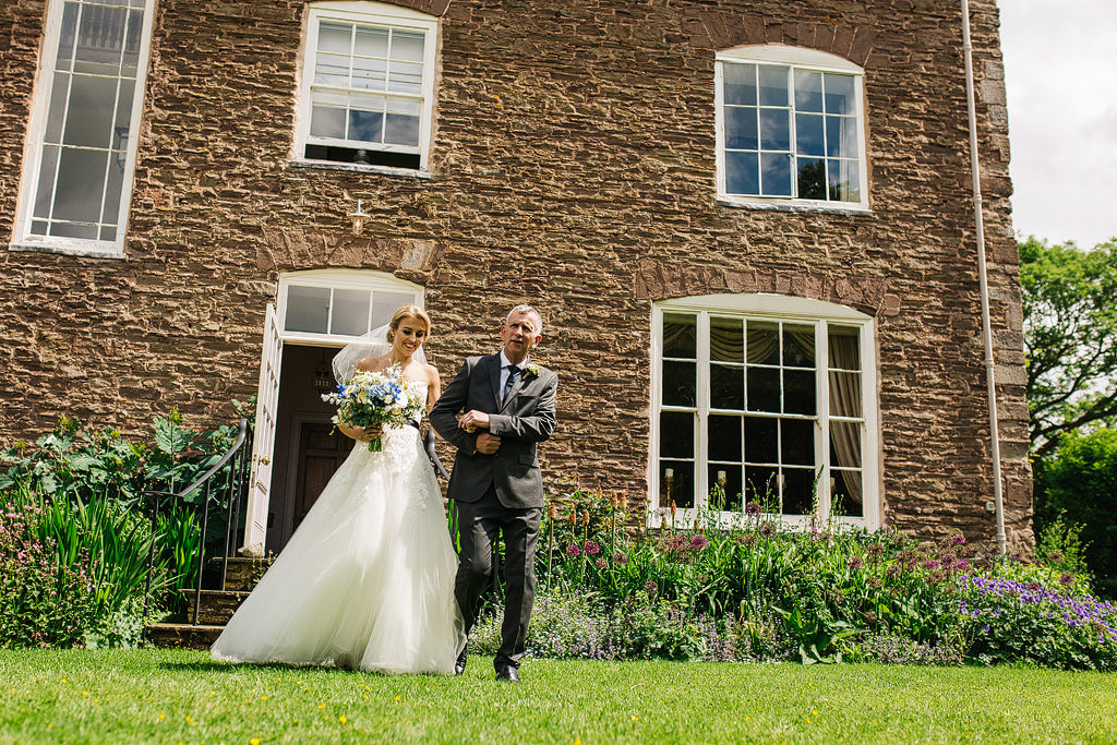 outdoor spring wedding ceremony at dewsall court
