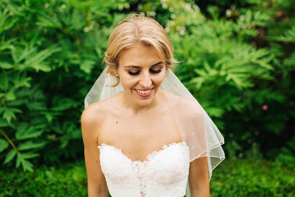 beautiful portrait of a bride at her barn wedding