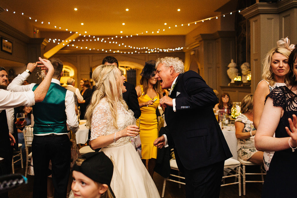 dad and daughter dance at a wedding