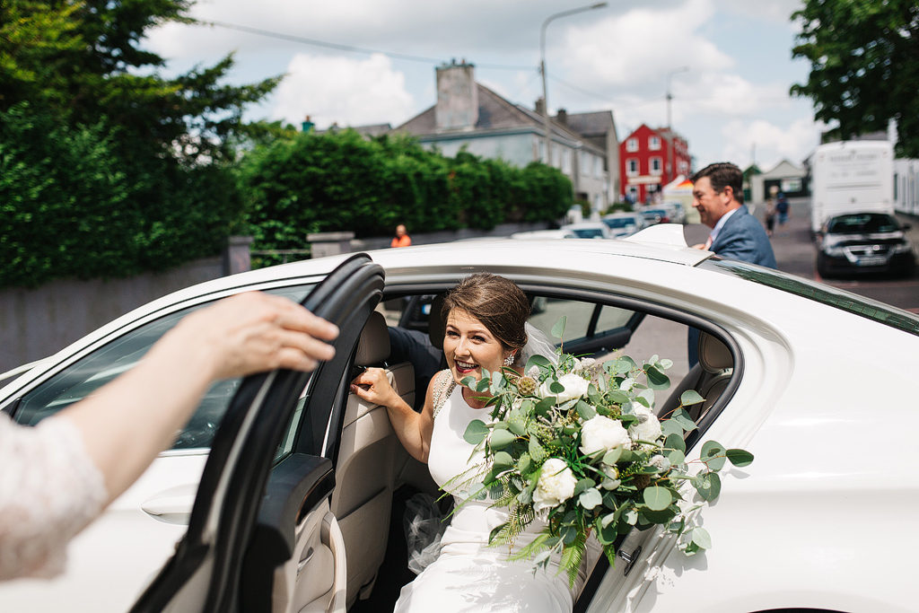 beautiful bride arriving for her wedding ceremony st michael s church sneem