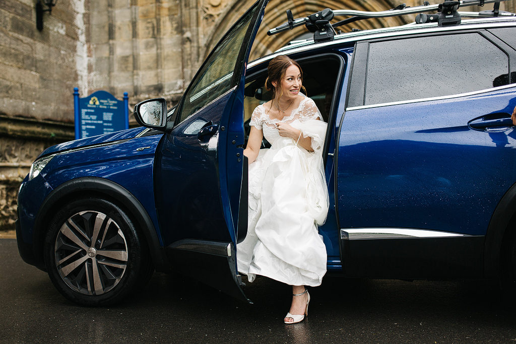 bride arrival at bolton abbey quirky wedding transport