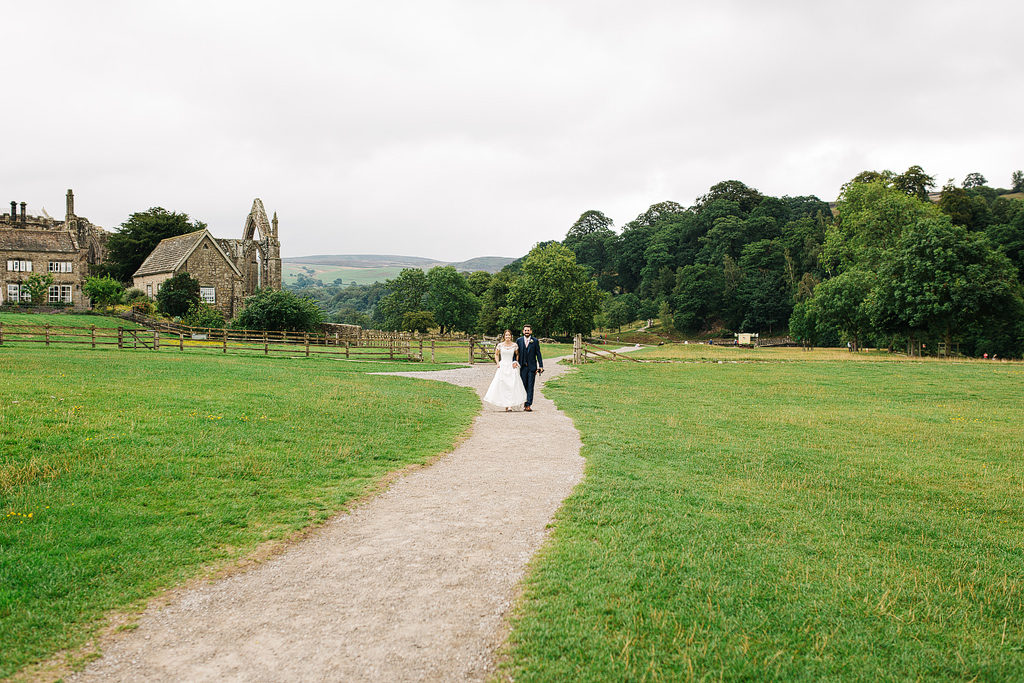 walking to the tithe barn at bolton abbey