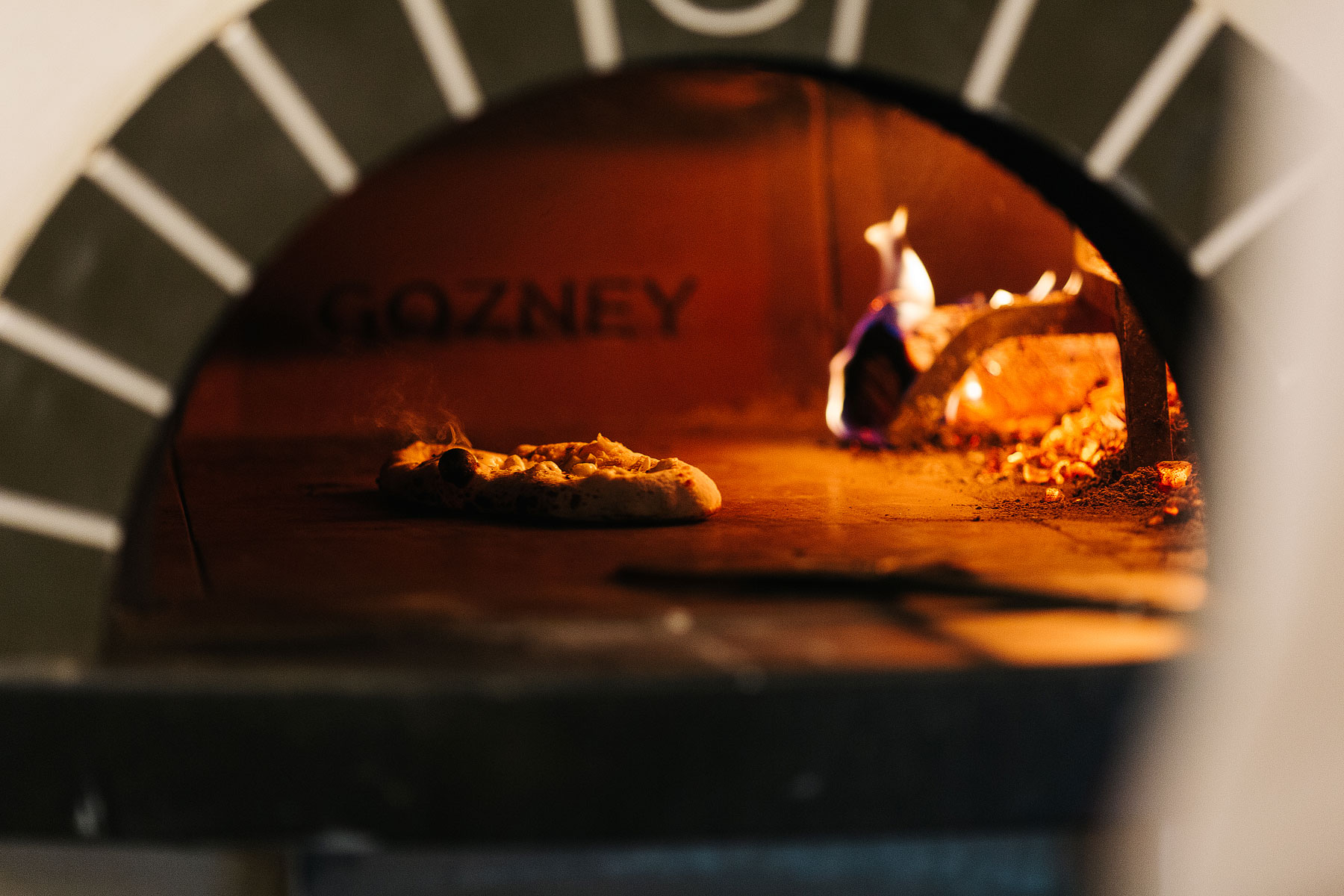 gozney pizza oven in action