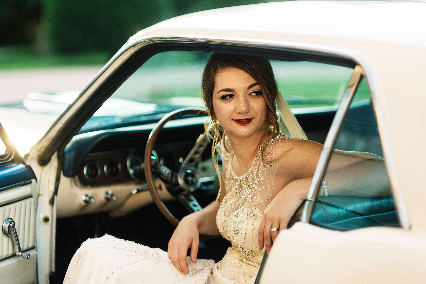 bride in a mustang car