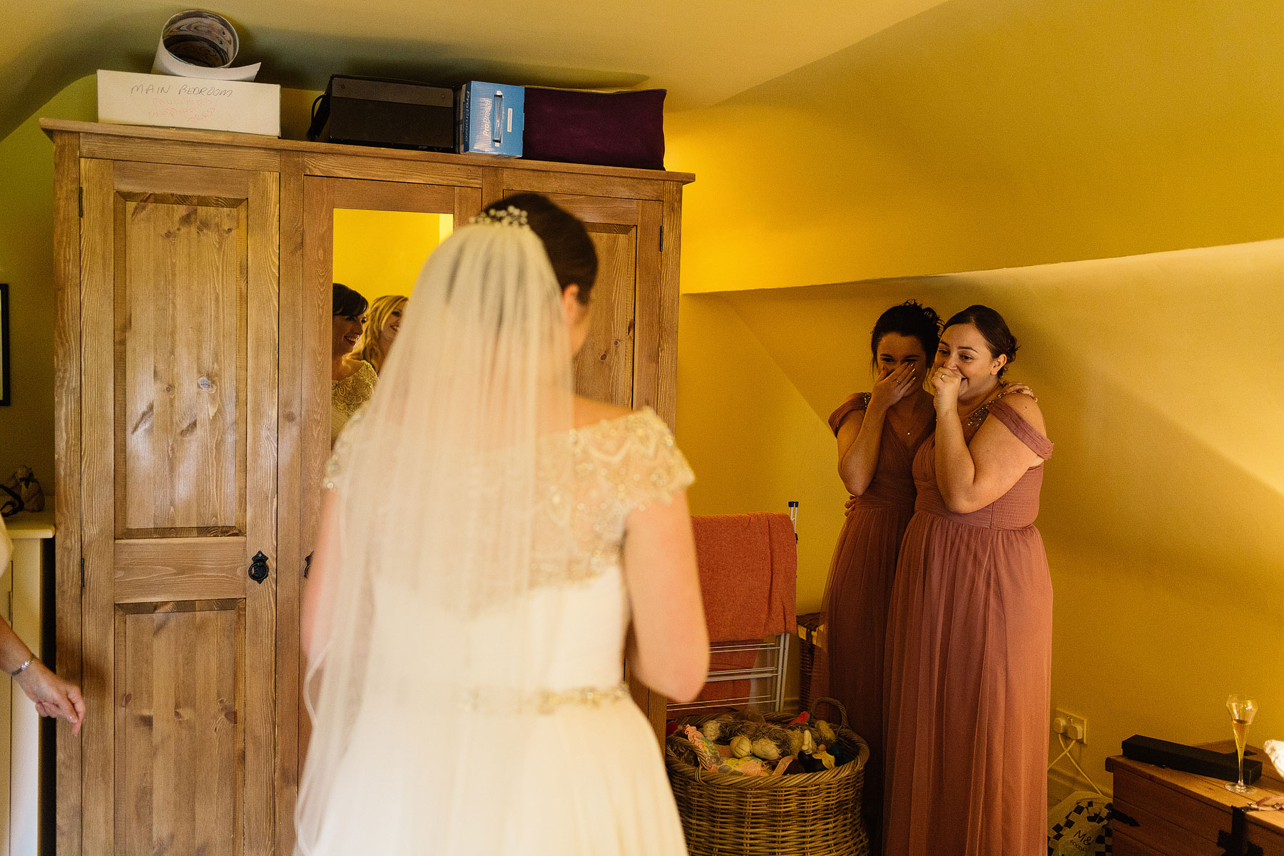 bride revealing her justin alexander dress