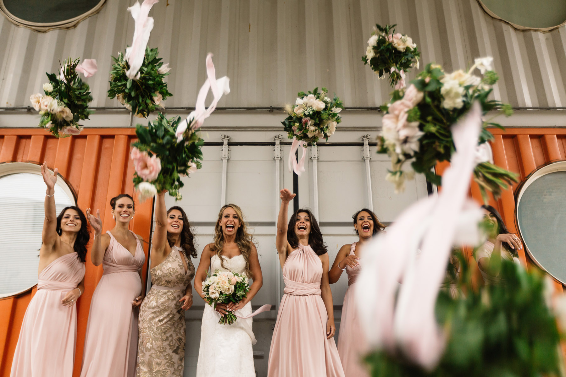 stefan + Kerri's awesome wedding photographs at Trinity Buoy Wharf in London with a Greek wedding service and subtle touches of greek wedding traditions.
