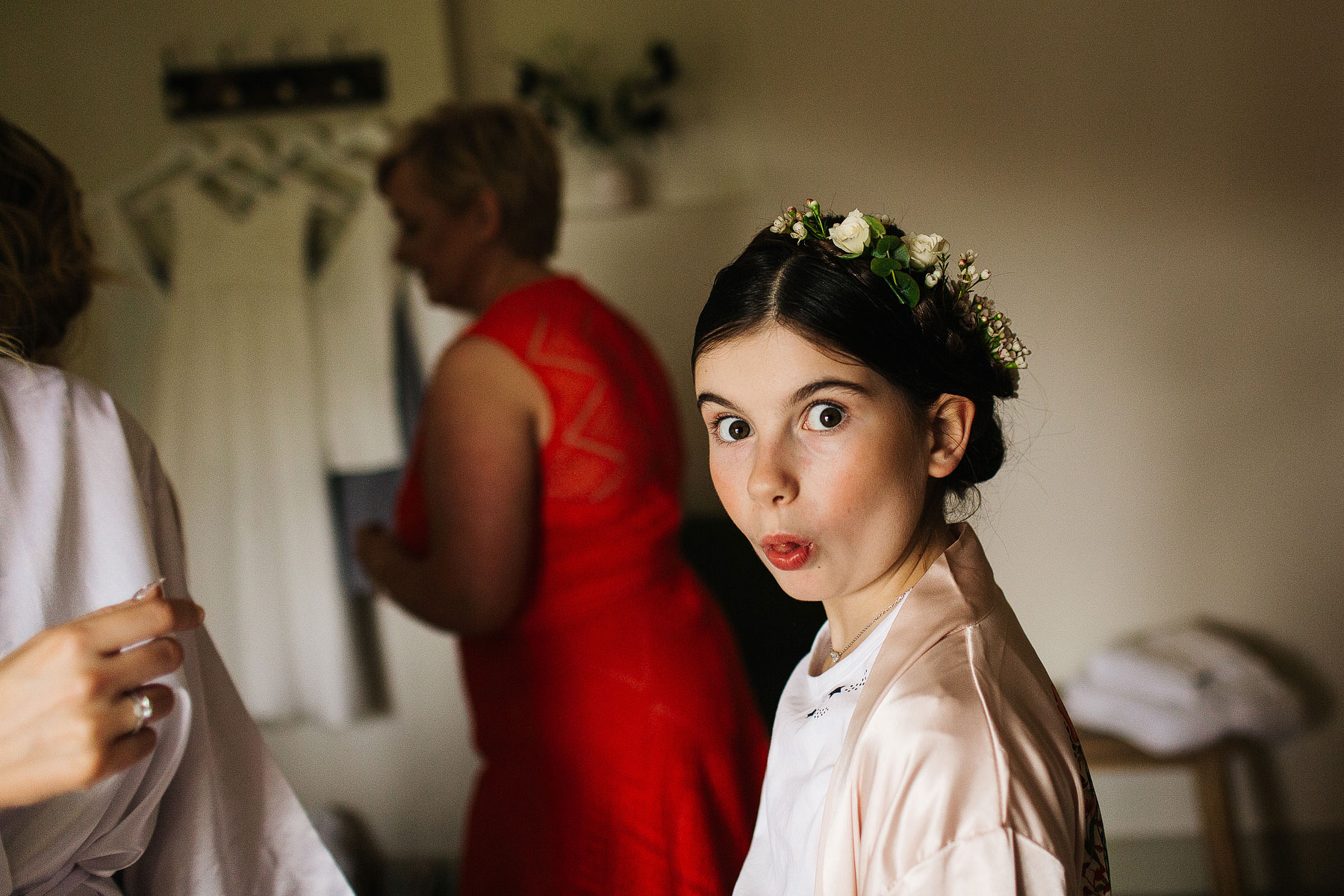 bridesmaid being funny wearing a flower crown