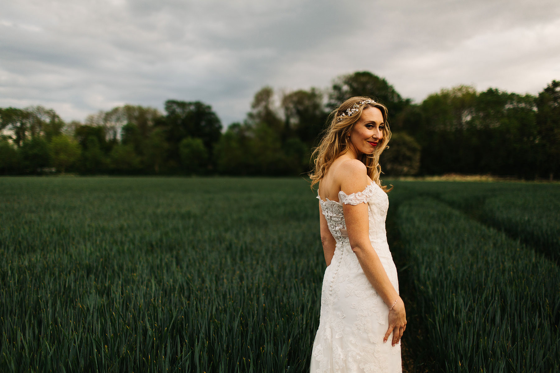 bride wearing her hair down ina field
