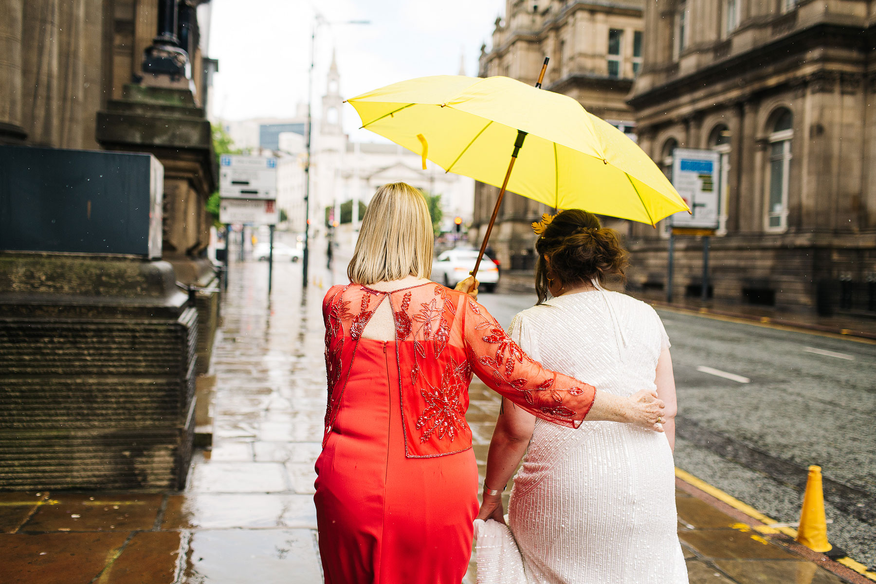 bride in the rain at leeds civic hall