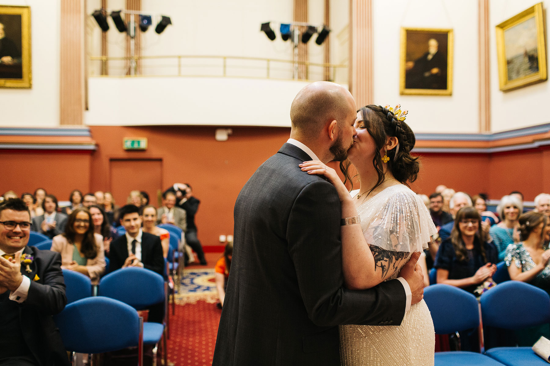 couple kissing after being announced man and wife
