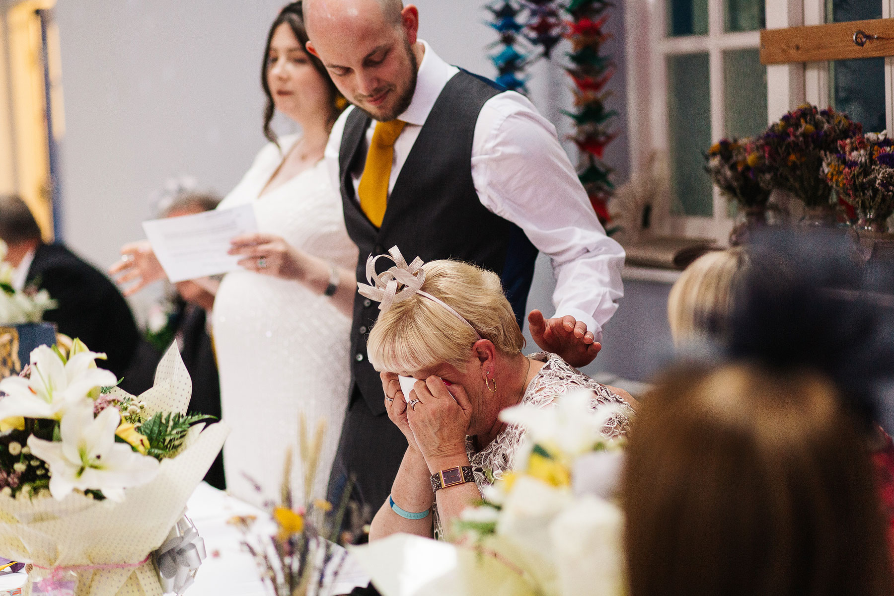 mother of the groom getting emotional during wedding speeches