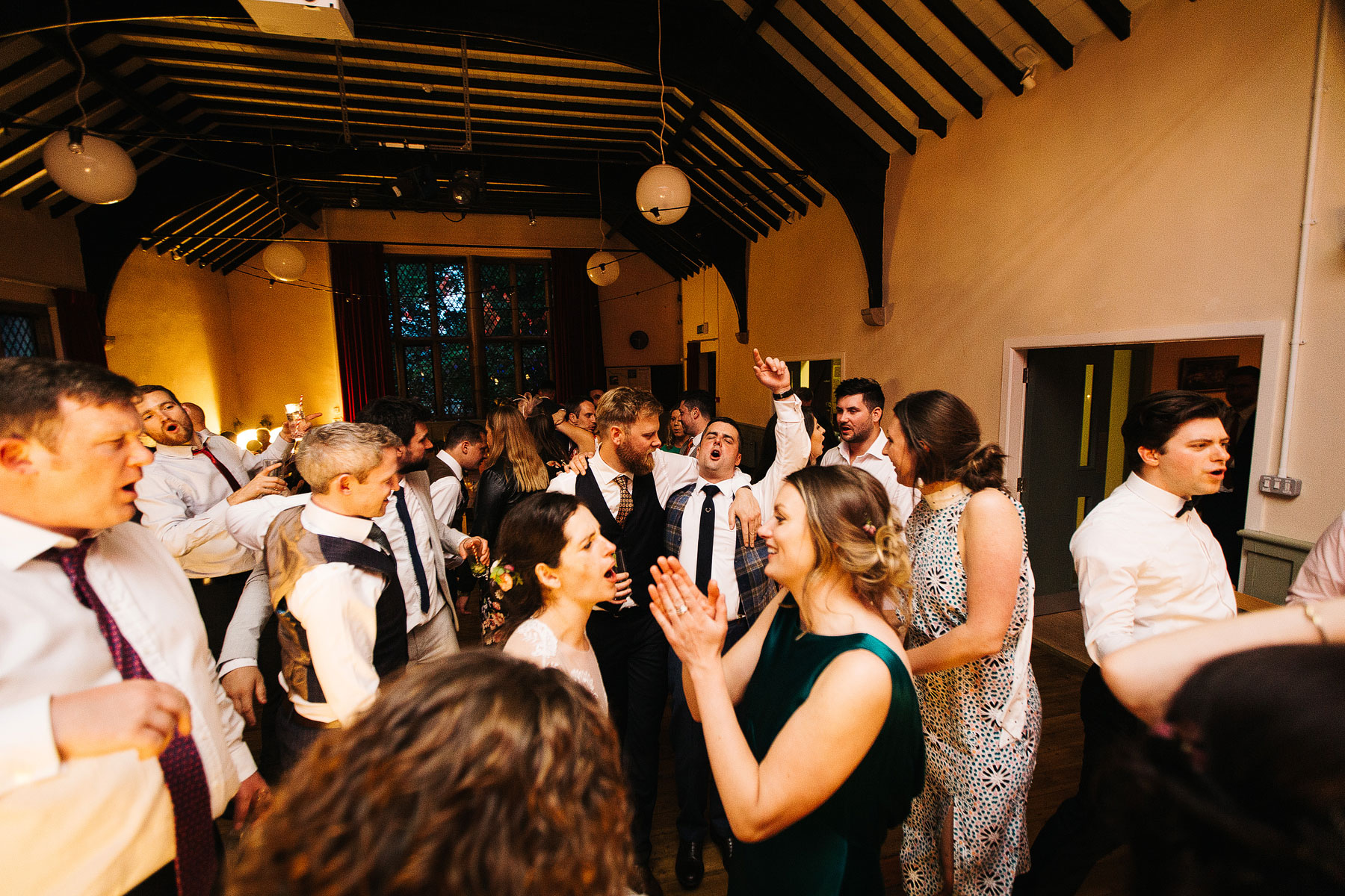 crazy dancing at a village hall wedding in burnsall