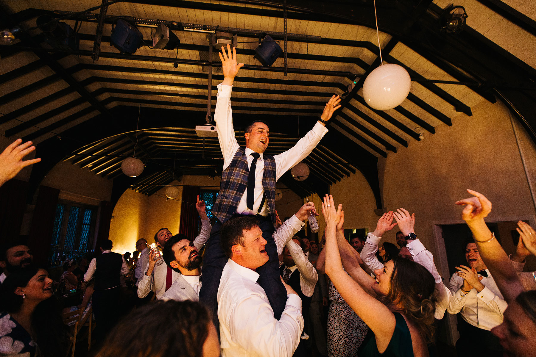 crazy dancing at a village hall wedding in burnsall