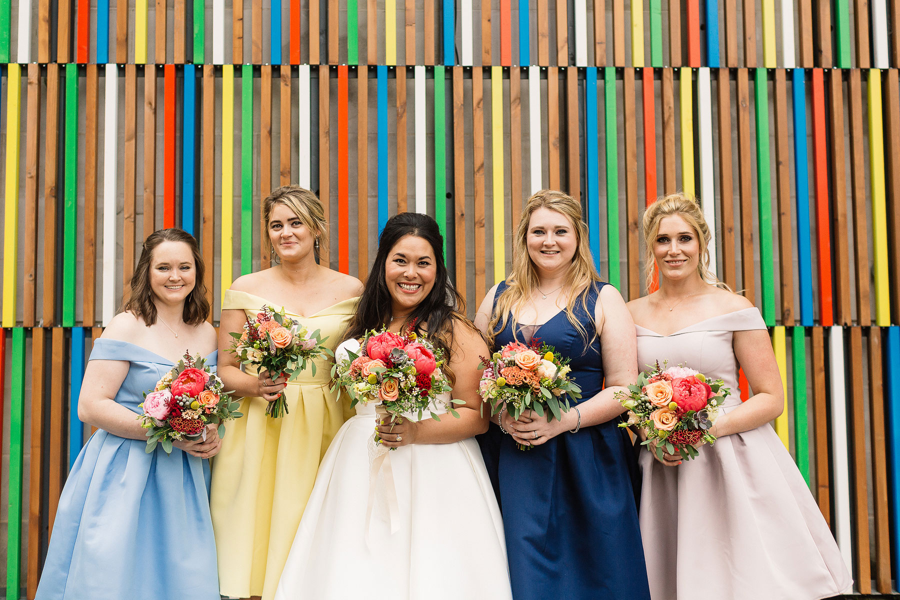 bridesmaids in multicoloured dresses for leeds wedding