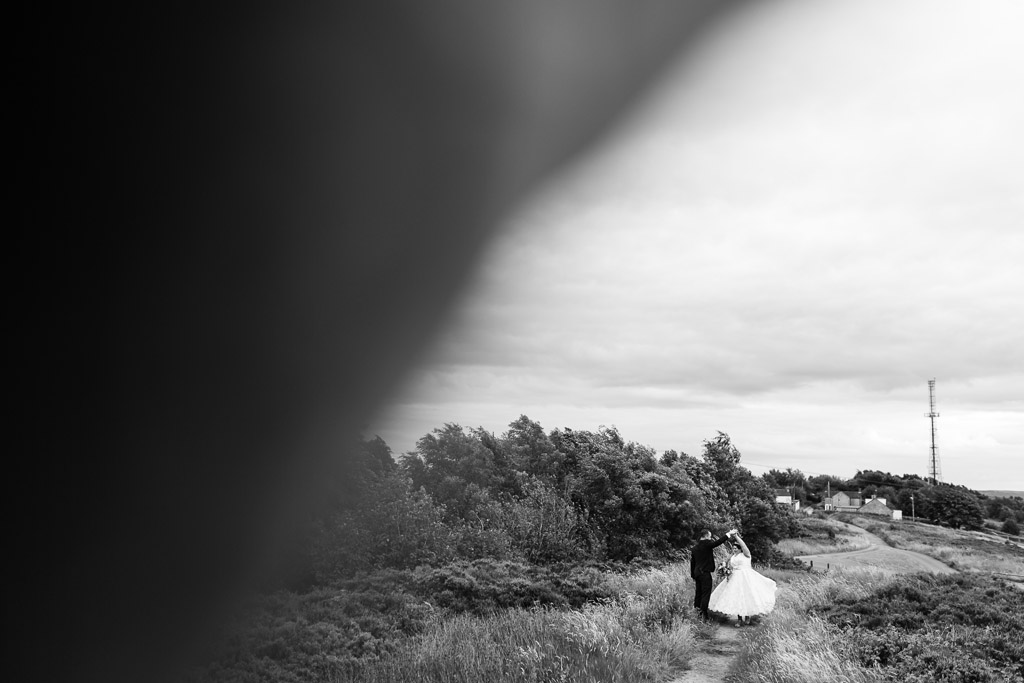 Bride and groom on the moors 