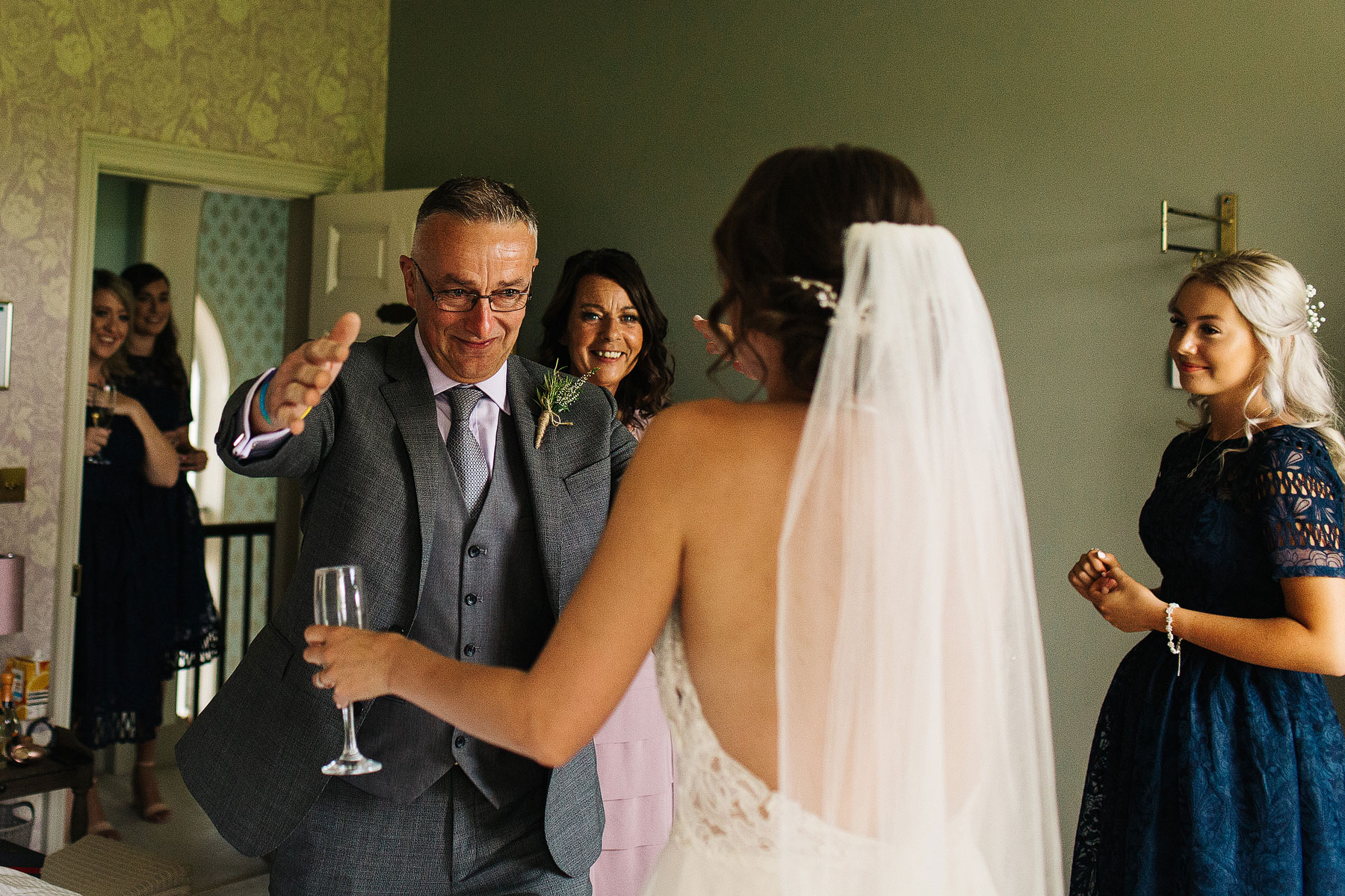 emotional dad sees daughetr in her wedding dress