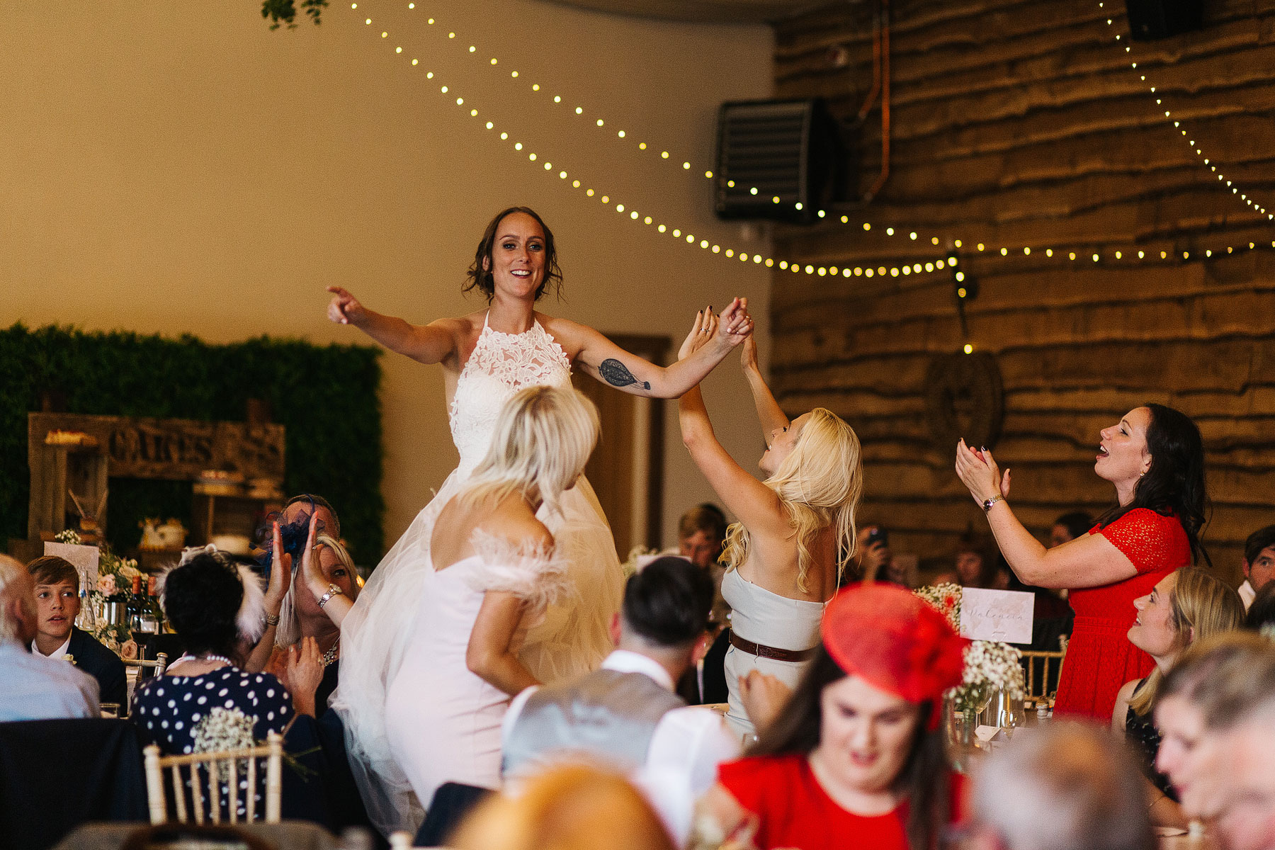 bride dancing on the tables at hornington manor
