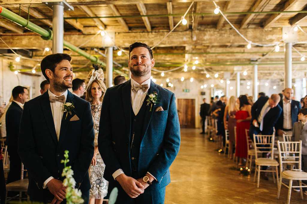 groom waiting for his bride at holmes mills brewery