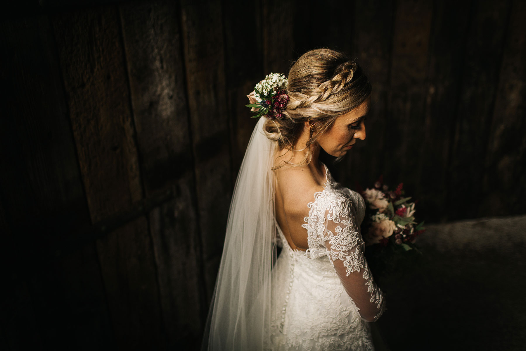 fine art images of a bride in a barn