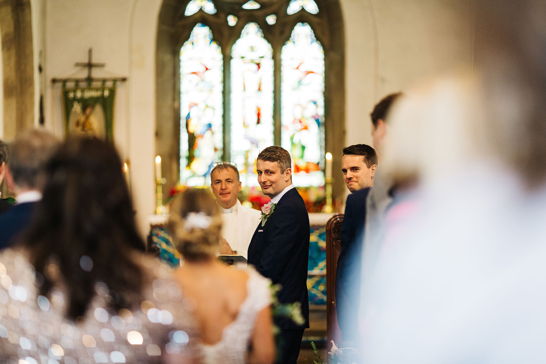 groom sees bride for the forst time at bolton abbey wedding