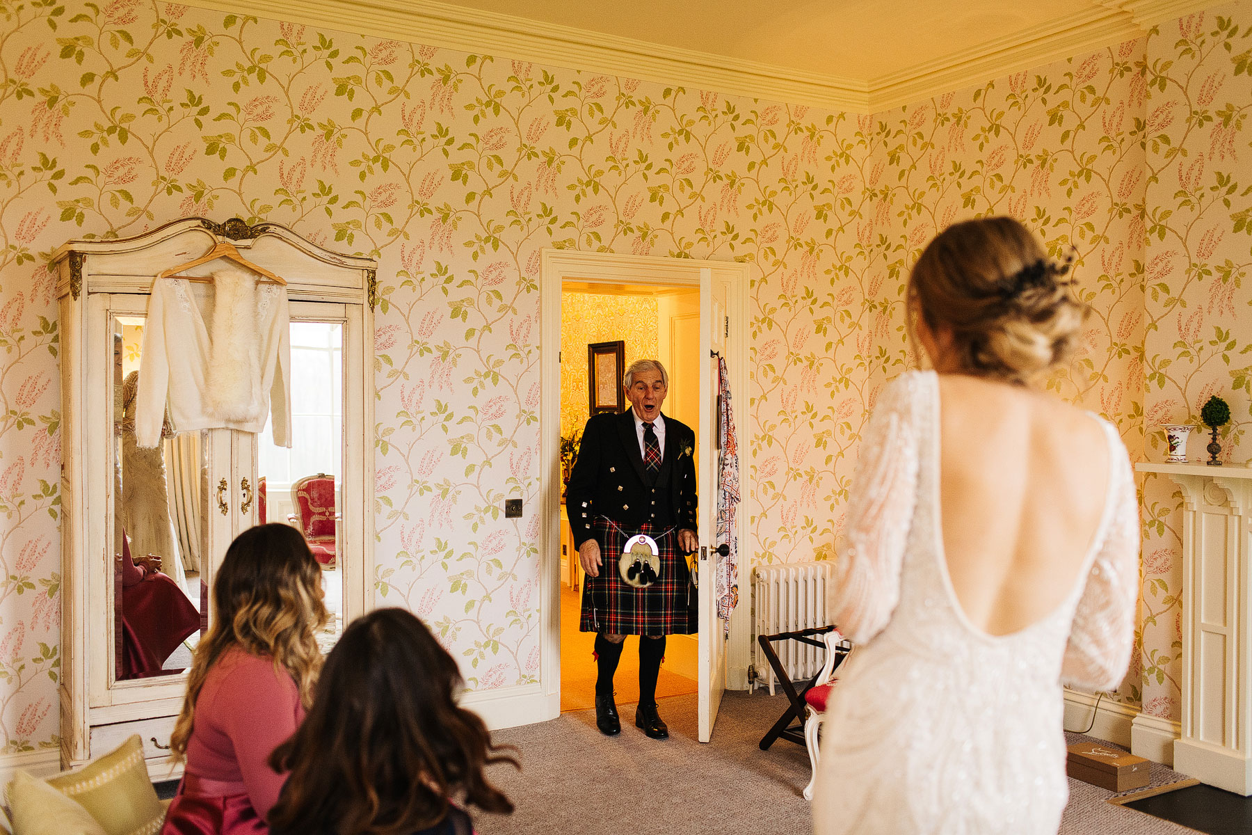dads reaction after seeing his daughter in a wedding dress in the lakes