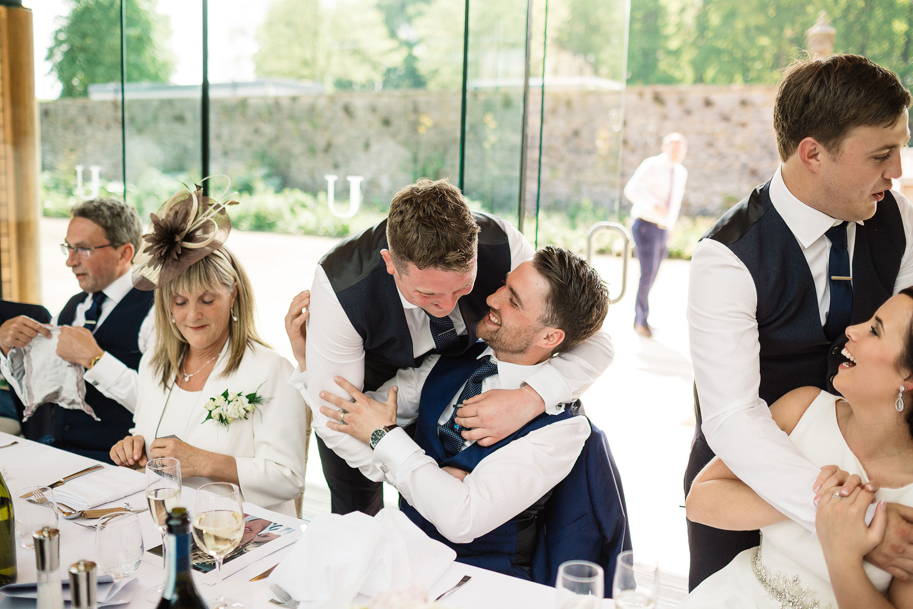 wedding speeches with best man hugging in yorkshire