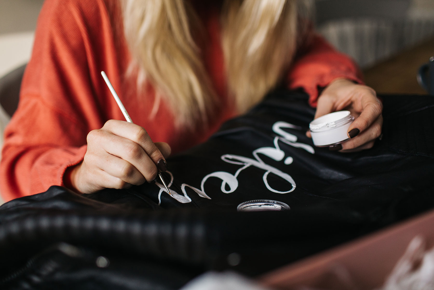 hand painting a wedding leather jacket