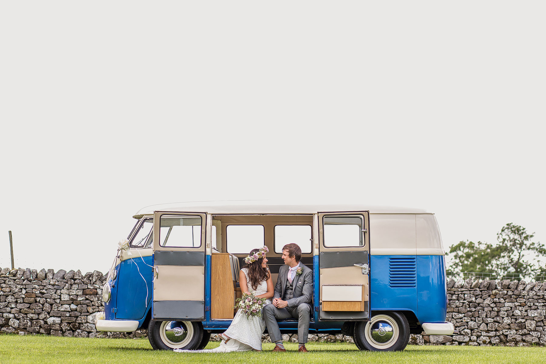 bride and groom in a campervan