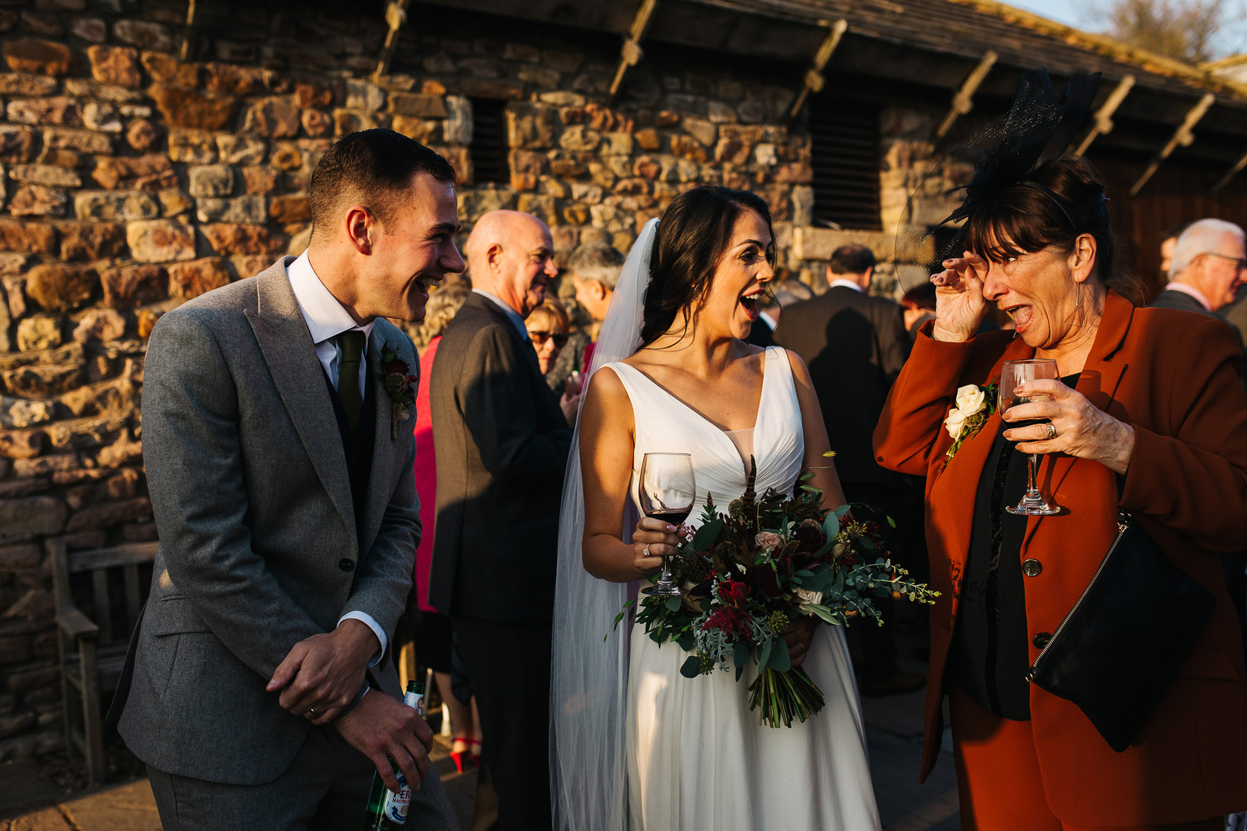 Autumn Wedding at Browsholme Hall with guests outdoors 