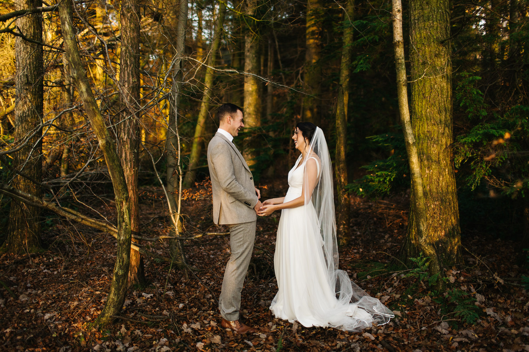 Bride and groom in the woods at Browsholme Hall 