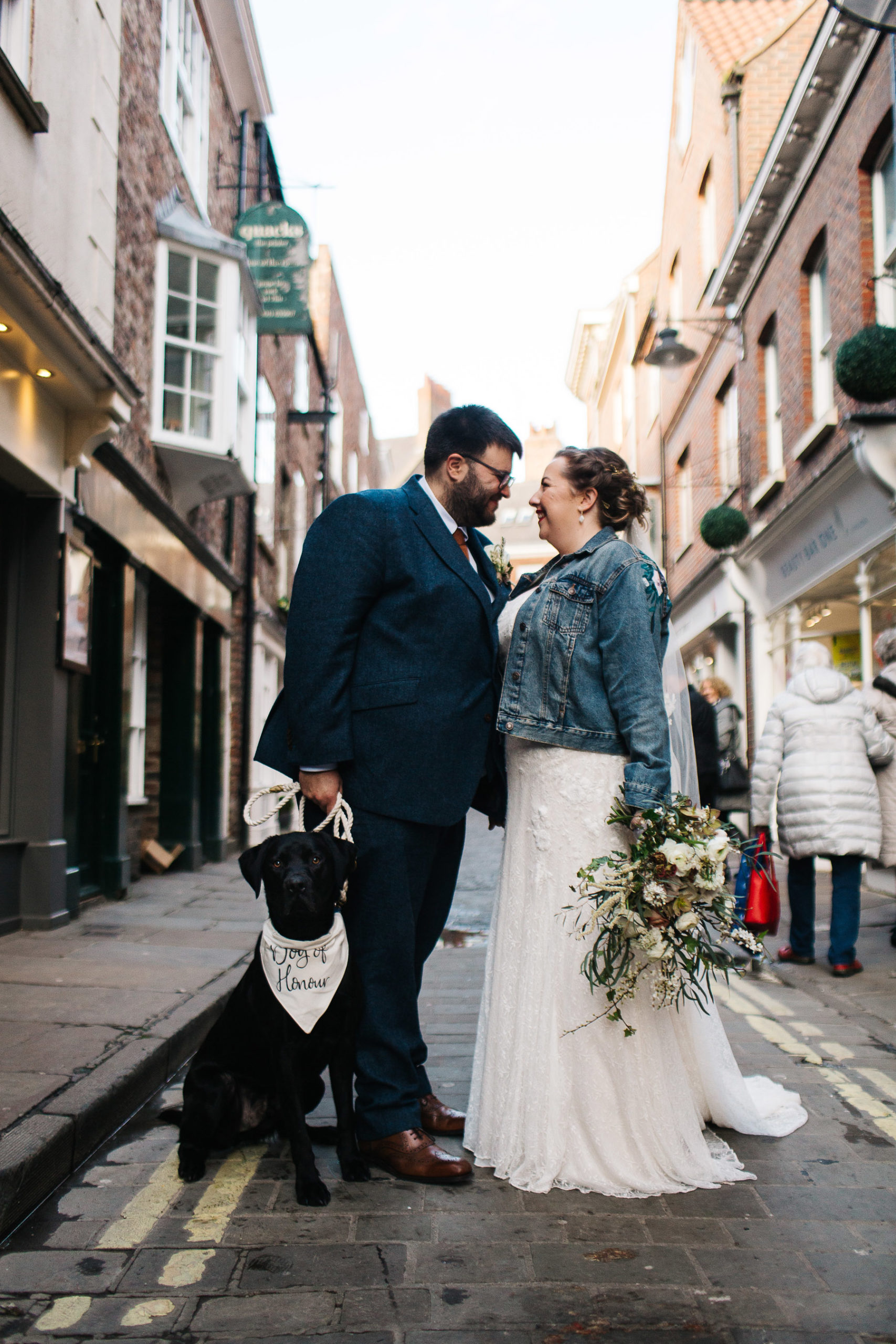 Bride and groom in york with a dog of honor
