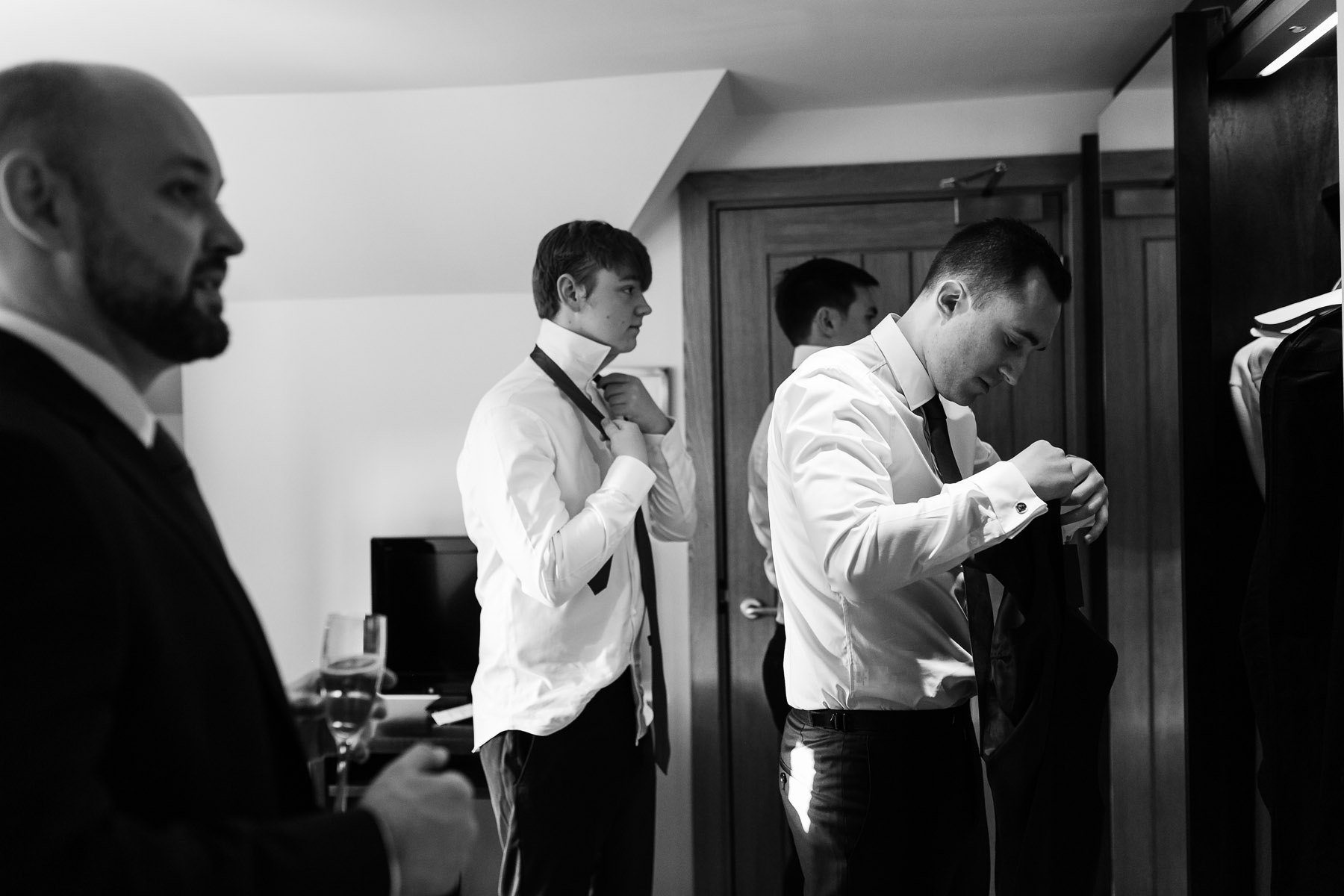 Groom getting ready for his wedding in Surrey 