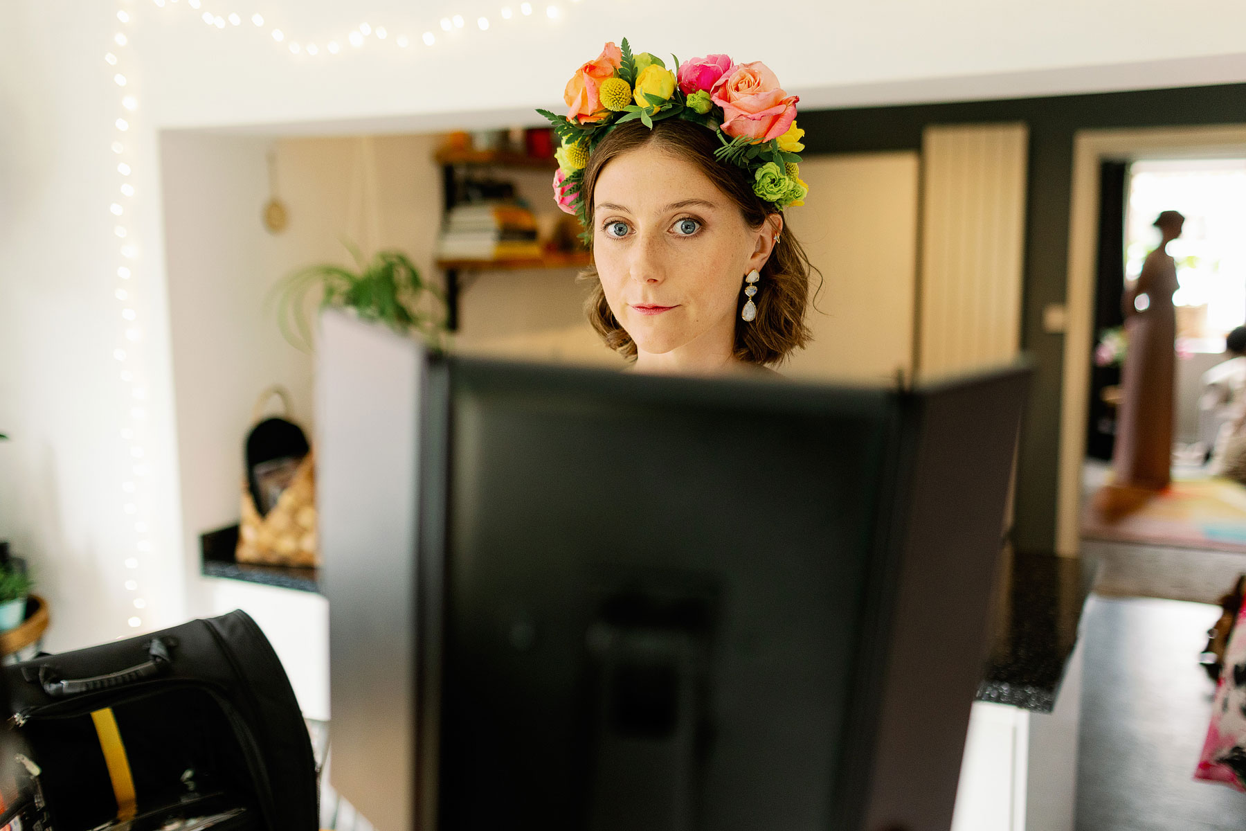 bride wearing a colourful flower headband