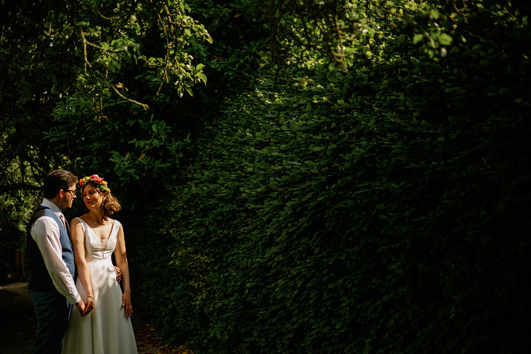 bride and groom portraits in the gardens at a barn wedding venue in yorkshire