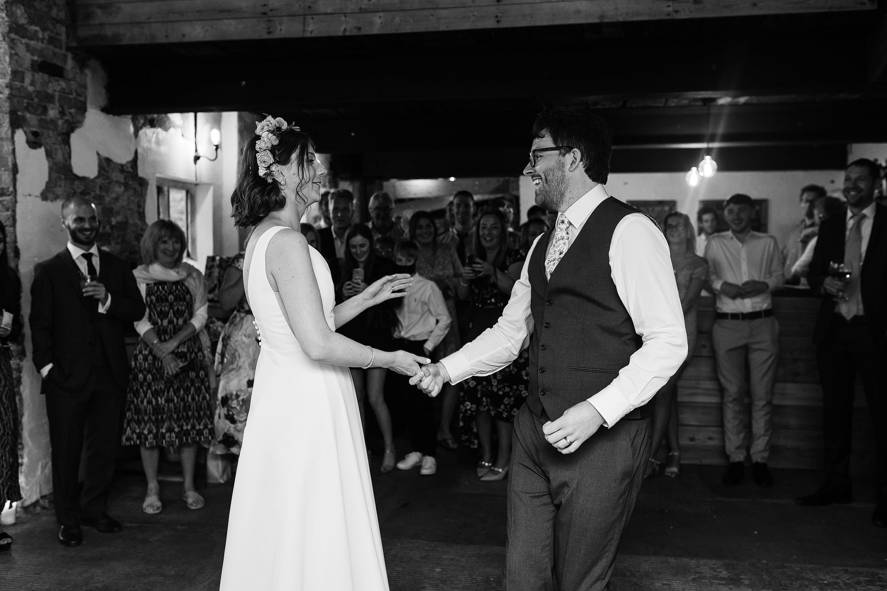 bride and grooms colourful first dance at woolas barn