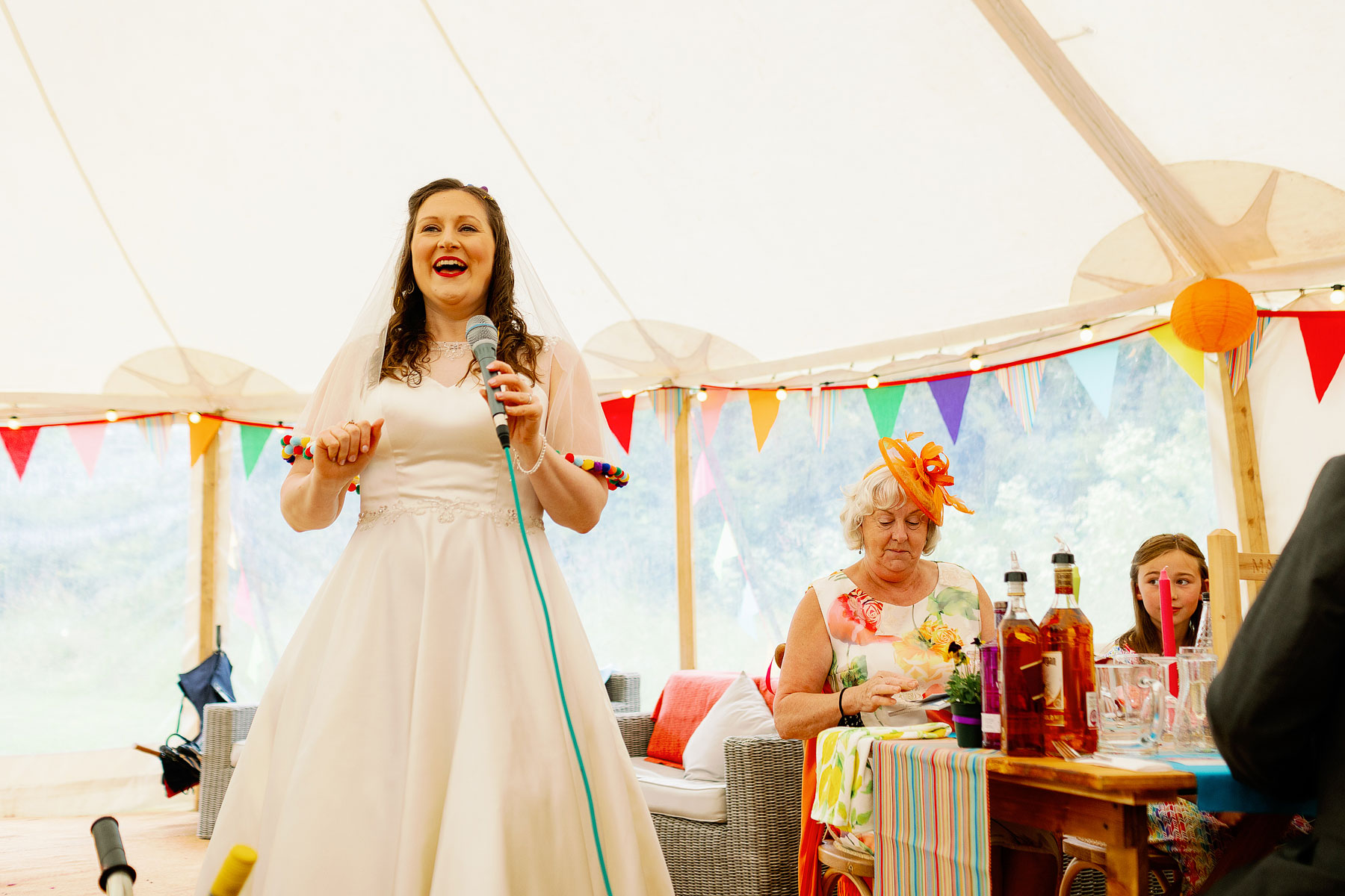 bride making a speech in a marquee in yorkshire