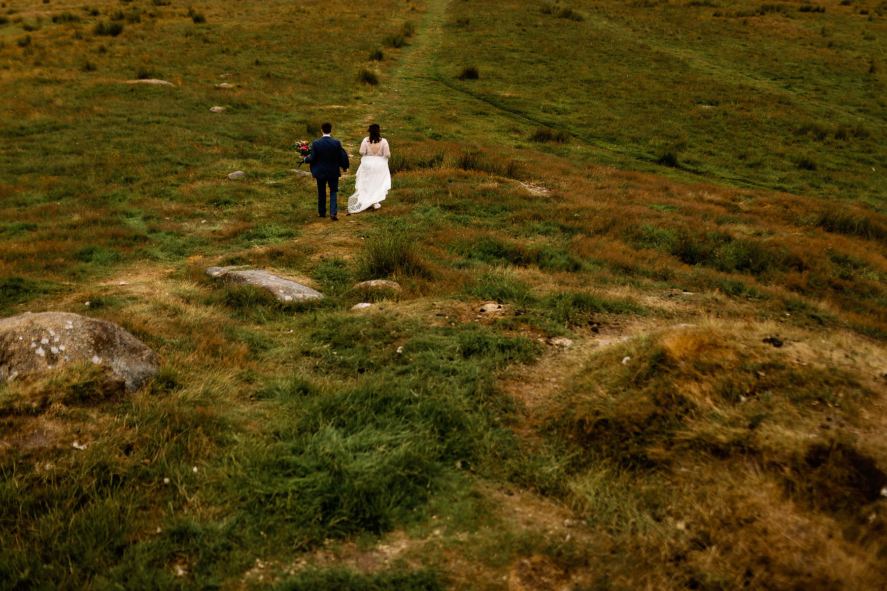 married couple walking on the yorkshire hills