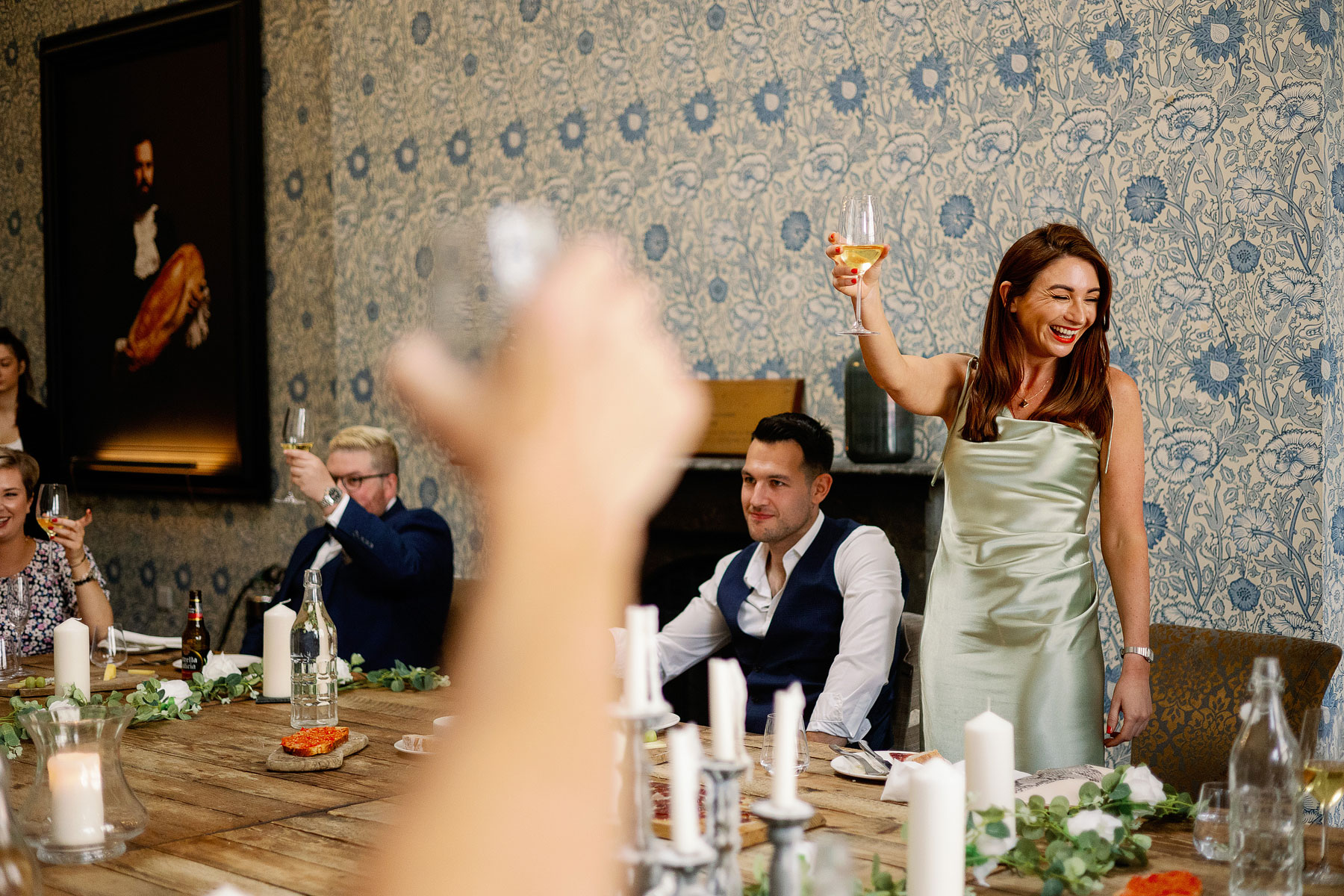 guest toasting after a wedding speech at iberica leeds