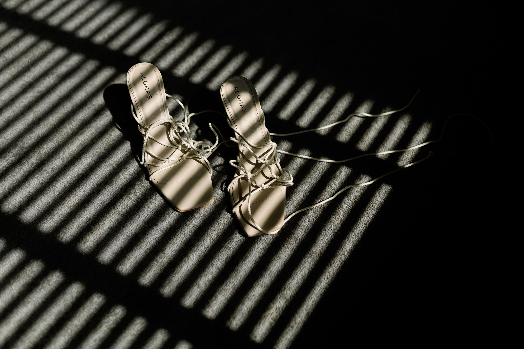 creative photograph of alohas bridal shoes in Dakota Leeds