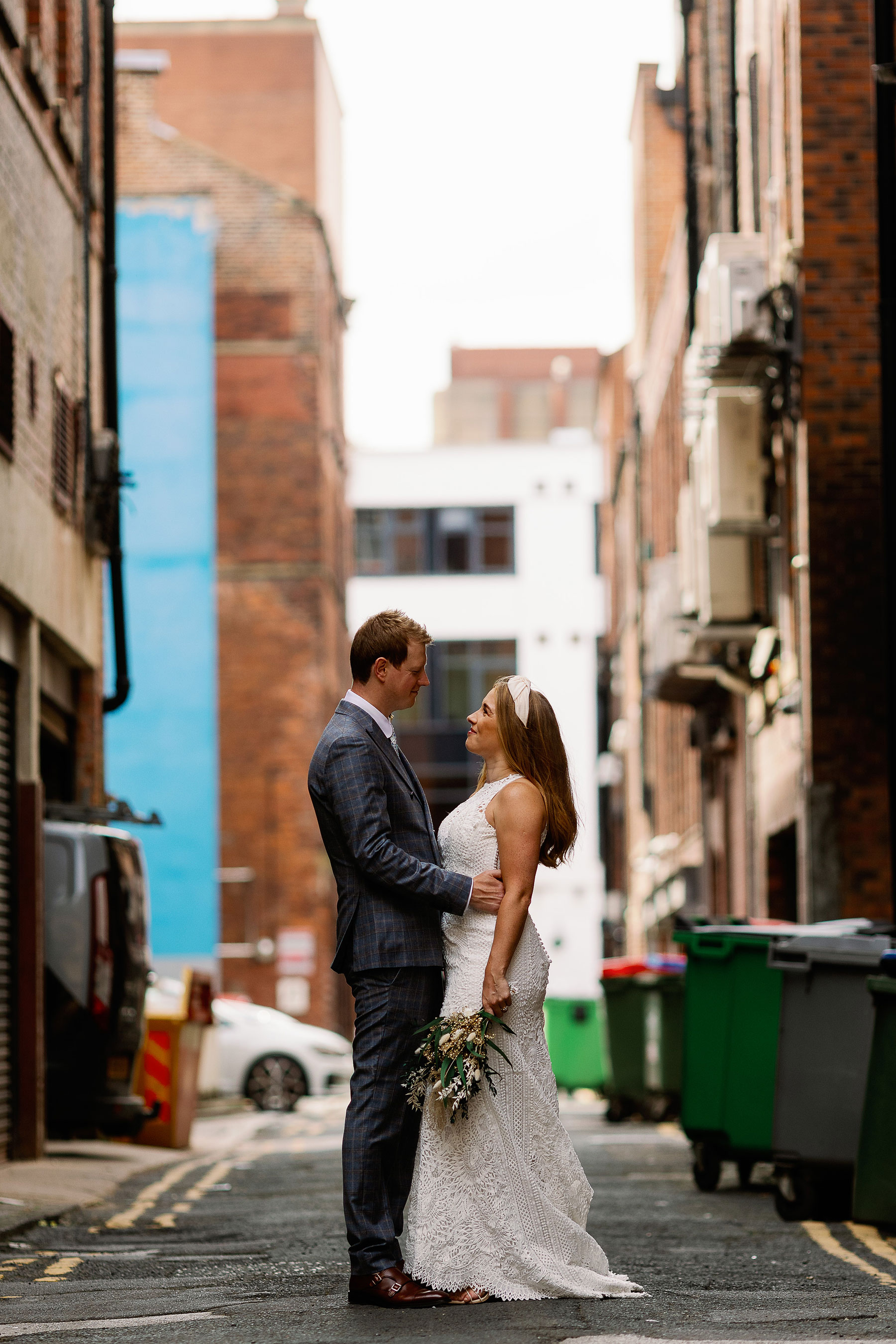 informal bride and groom portrait in the streets of Leeds