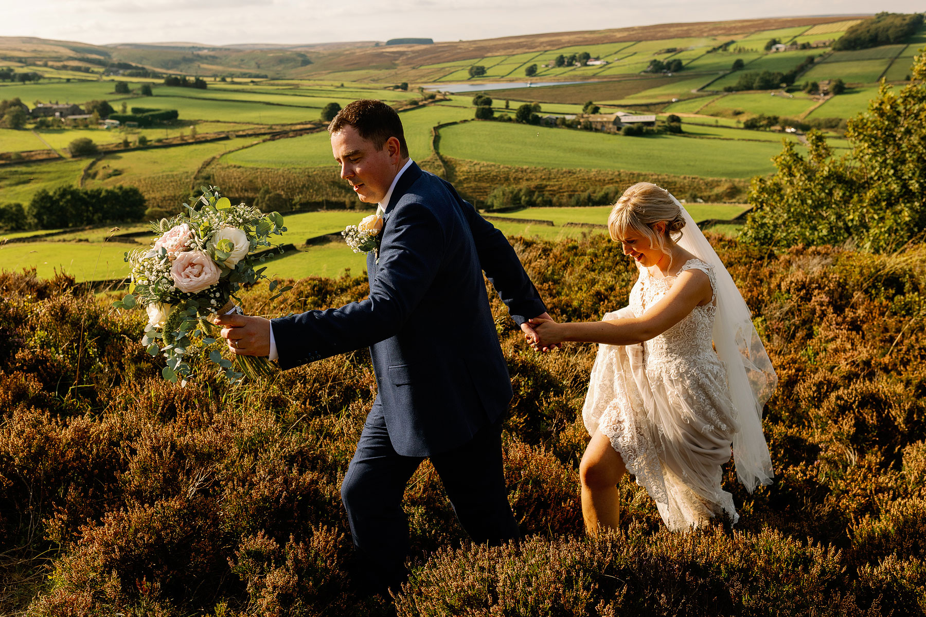 bride and groom on the moors at golden hour in haworth yorkshire
