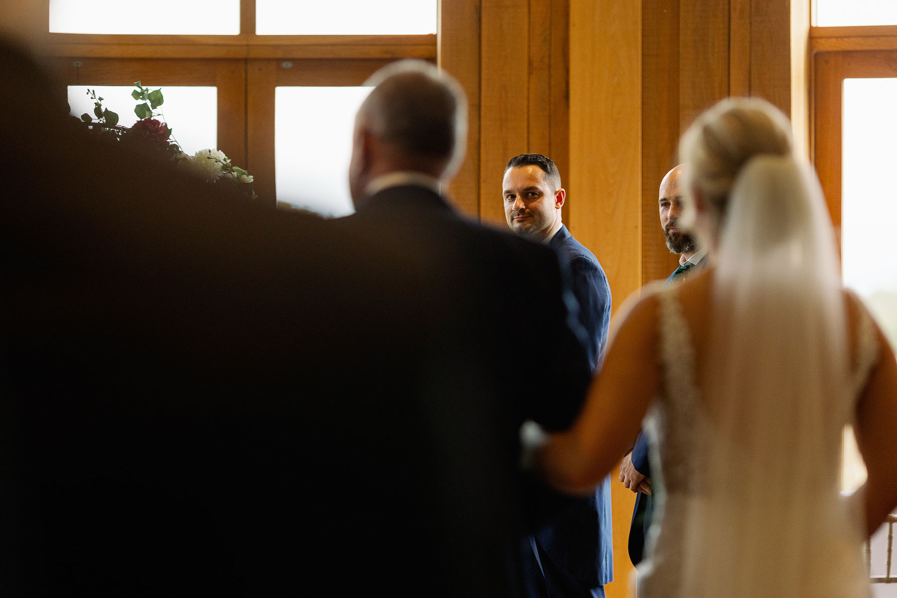groom looking at the bride for the first time