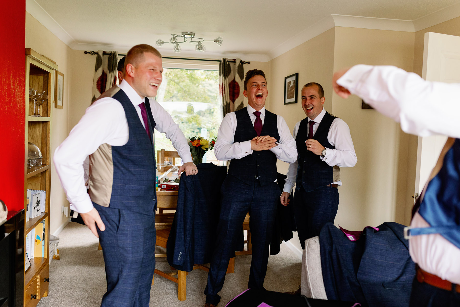 Groomsmen having fun before a wedding in Oakworth 