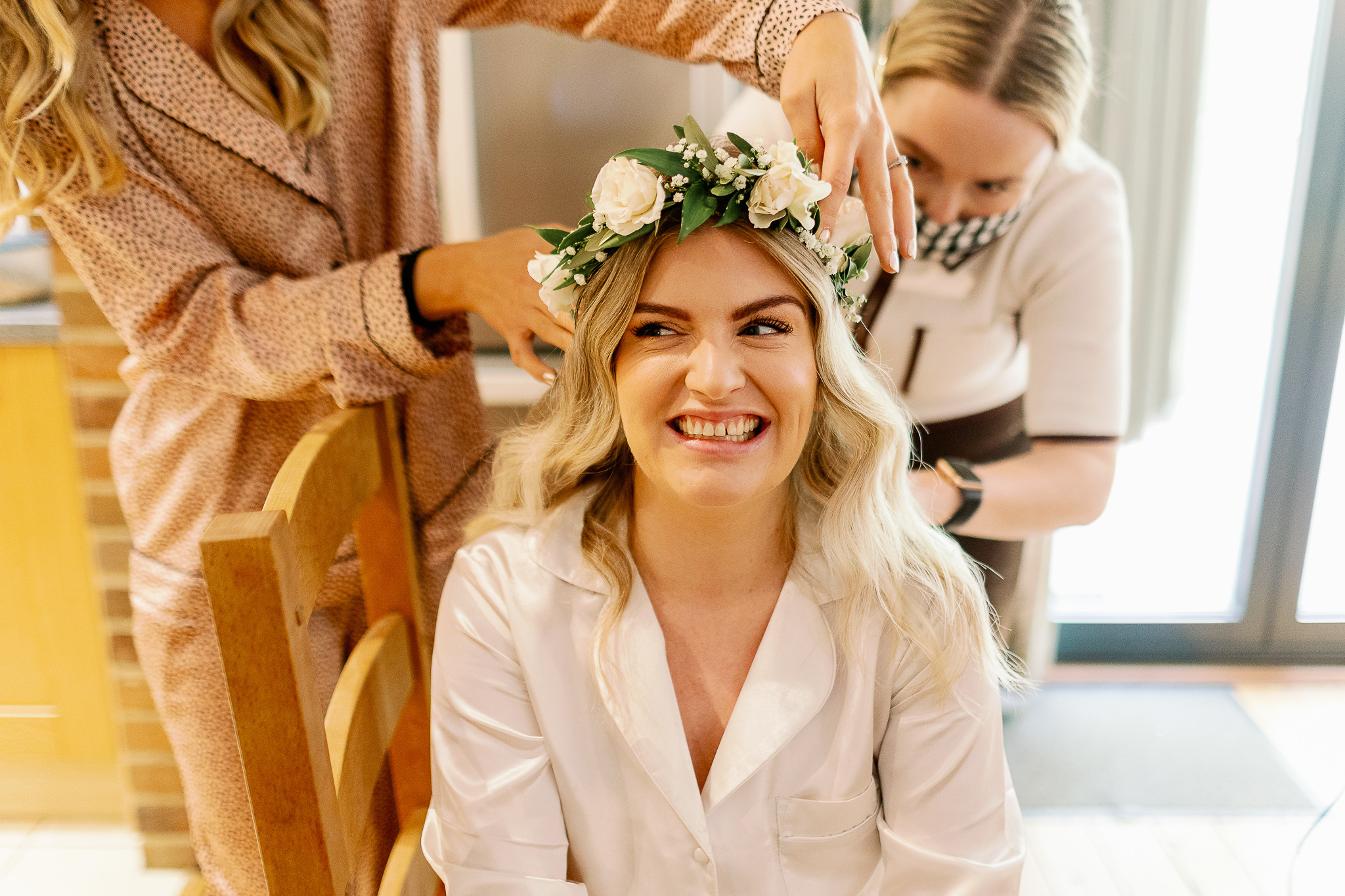 bride wearing a flower crown at Sandburn Hall 