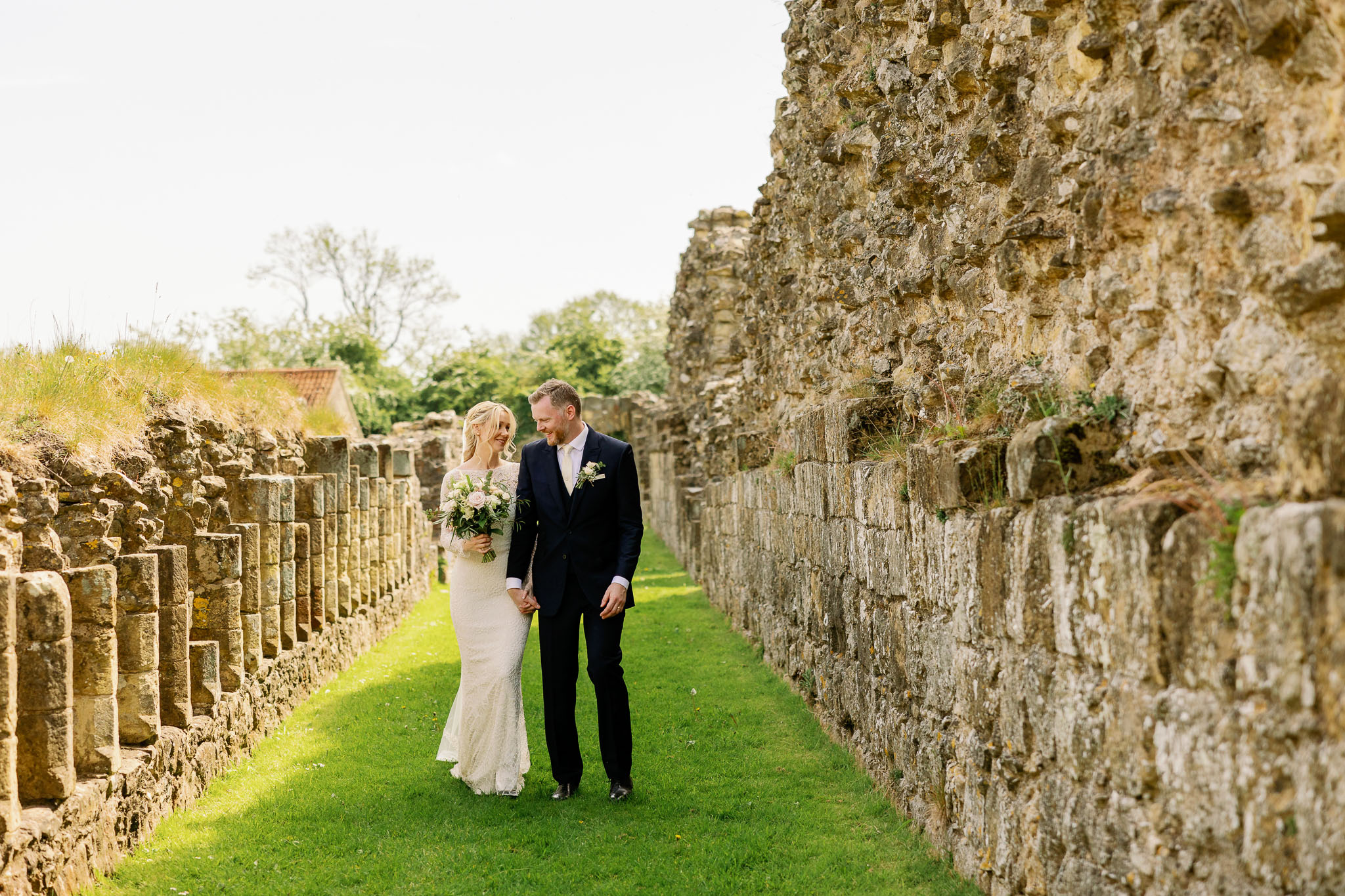 Bride and Groom wandering around the grounds of Byland Abbey 